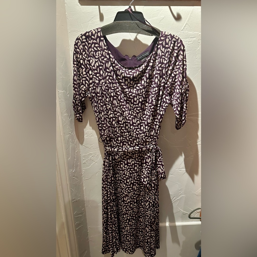 Purple dress with white design. Could be used for a work dress or a Sundays best